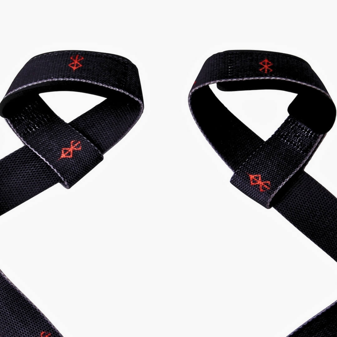 Close up of Berserk lifting straps on display. Perfect for weightlifting,and strength training. A unique anime gym gear gift for fitness lovers.