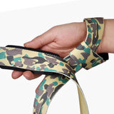 Closed up view of model with camo lifting straps | Camo lifting straps made from polycotton for powerlifting and weightlifting and strength sports such as deadlifts in the gym.