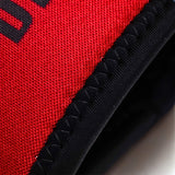 Close-up of the red neoprene fabric and reinforced stitching on Power Dragon elbow sleeves.