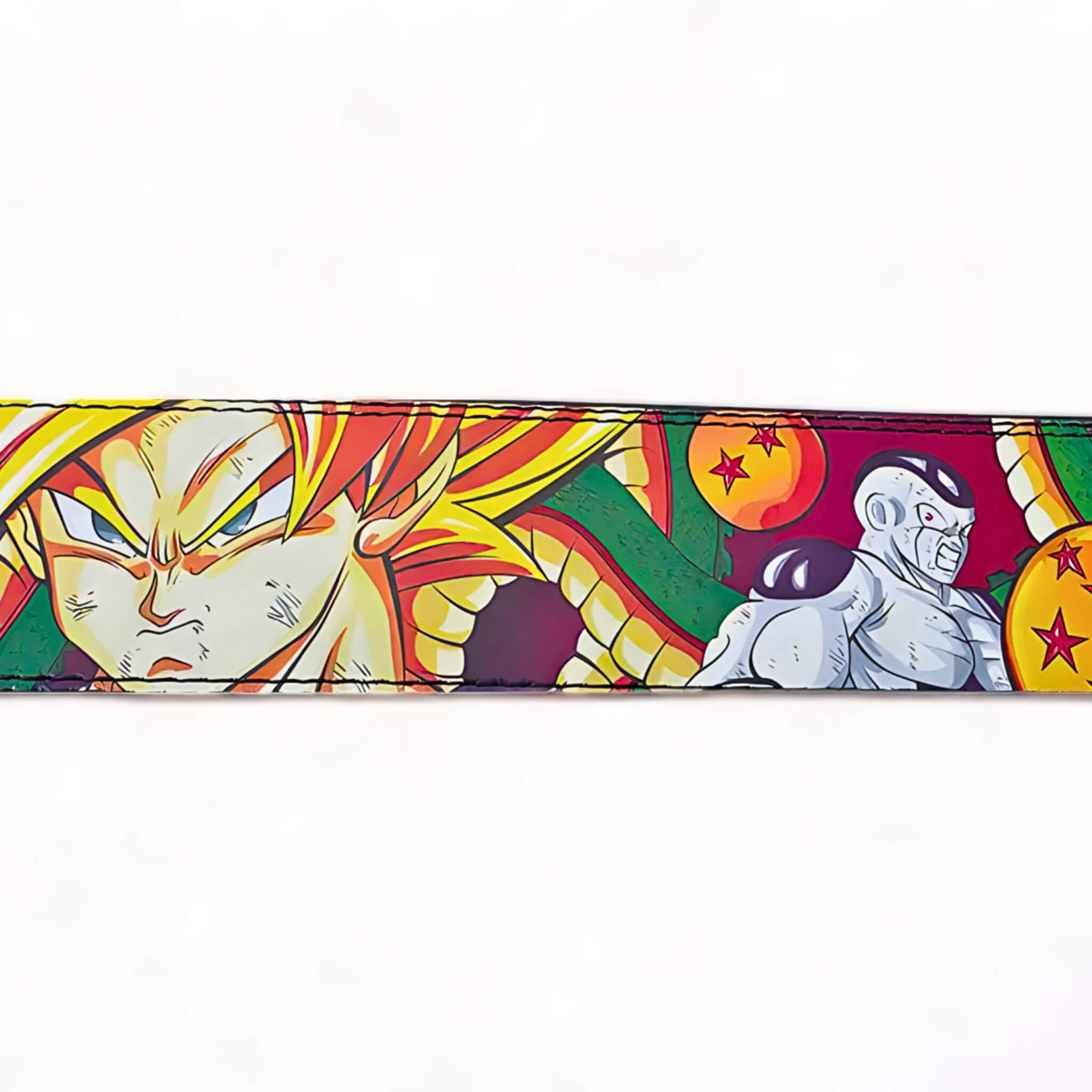 Close-up of the Dragon Ball Z lifting belt displaying Goku and Frieza's detailed artwork, highlighted by the colorful Dragon Balls in the background