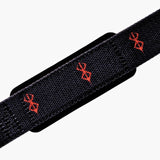 Alternate closed up of Berserk lifting straps on display. Perfect for weightlifting,and strength training. A unique anime gym gear gift for fitness lovers.