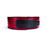 Highlighting a vibrant red crocodile texture with a sleek black lever buckle. This belt offers top-tier support and style, perfect for dedicated lifters aiming for excellence.