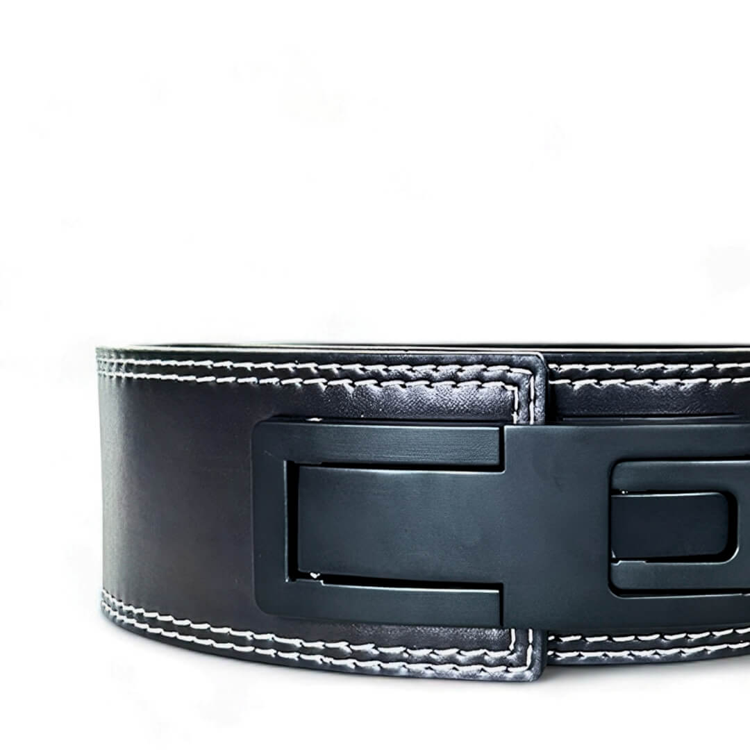 Closed up front view of the 'STRENGTH' PRO SERIES Weightlifting Belt showing the kanji for strength and the lever buckle | This lifting belt combines high-quality materials and ergonomic design to enhance lifting performance.