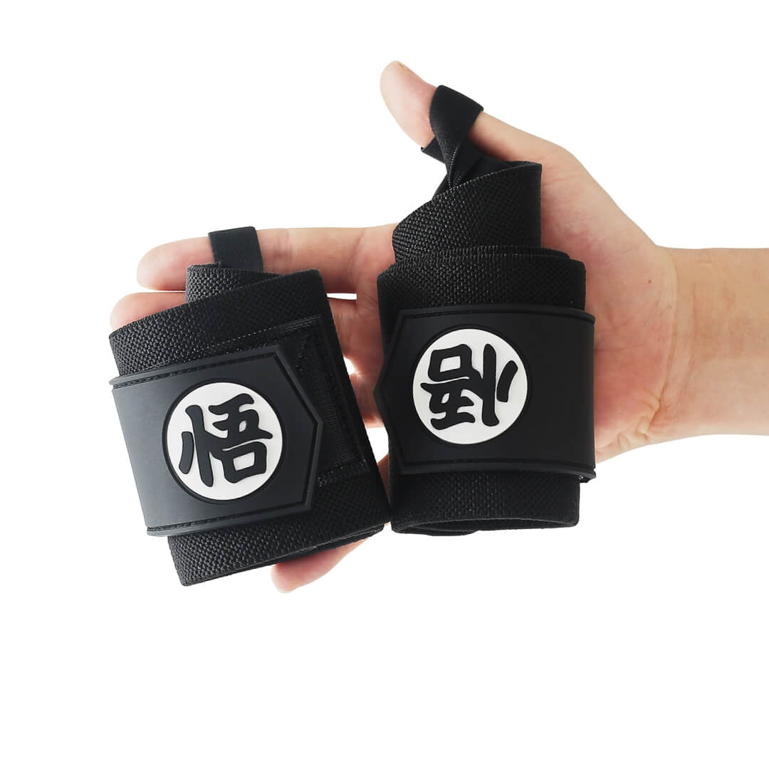 Black Dragonball Z wrist wraps displayed | black anime wrist wraps inspired by DBZ for strength training such as powerlifting